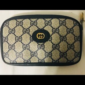 Authentic Navy Blue Gucci clutch/make up bag.